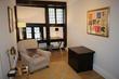 Holborn therapy room to rent in London with armchair & traditional tudor building design with black and white wood beams